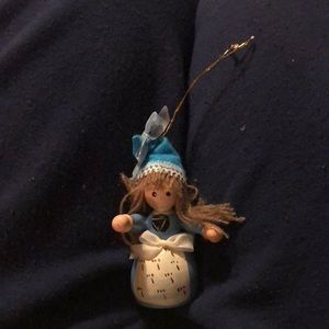 Three vintage, wooden ornaments.